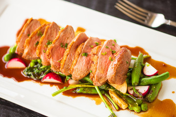 duck breast with garlic snap peas