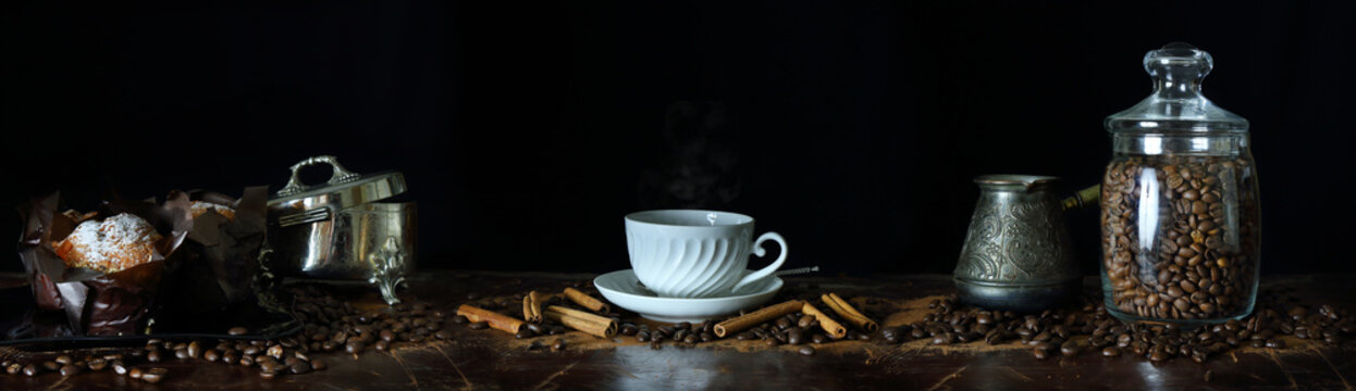 Fototapeta Panorama with a Cup of coffee, coffee beans and muffins