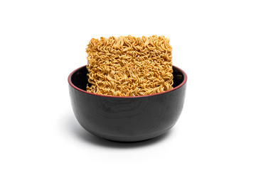 Instant noodles and cup isolated on white background.Instant noodles for people Do not like to eat vegetables.Instant noodles in black cup on white background.