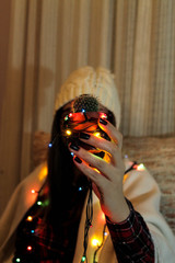 Girl holding decorated cactus