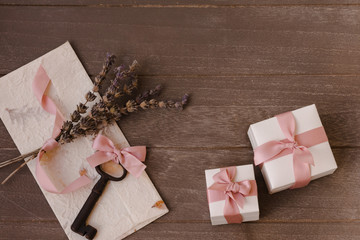 Valentine's day concept on wooden background with gifts.