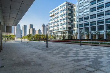 modern office buildings exterior with empty pavement