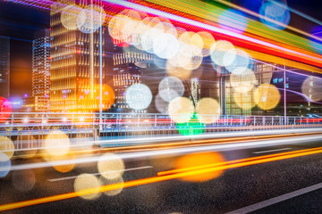 Abstract blur city night traffic background, colorful light trace from night traffic