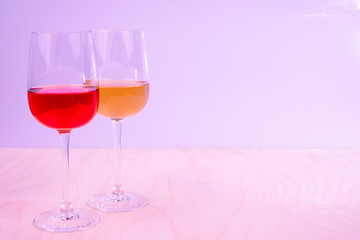 Two glasses with white and red wine