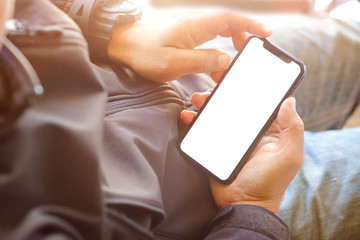 High angle shot of an unrecognizable businessman using a mobile phone