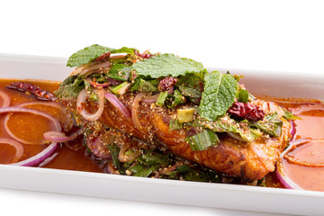 Fried Salmon steak with Spicy seafood mince sauce with mint leaf and shallot