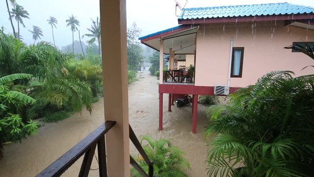 Flooding and tropical rain on the street in island Koh Phangan, Thailand