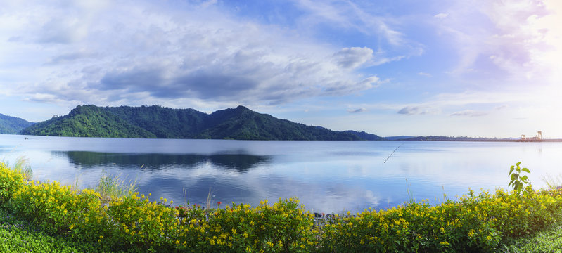 Panoramic image of beautiful Khun Dan Prakarn Chon Dam with reflection , the largest and longest roller compacted concrete (RCC) dam in the world , Nakhon Nayok , Thailand