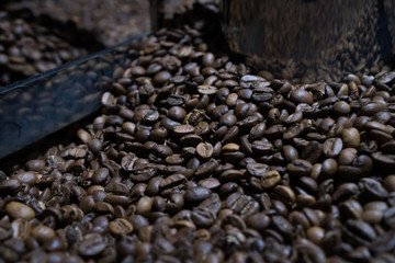 Mixing roasted coffee