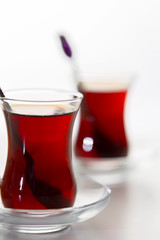 Turkish tea in traditional glass isolated on white background