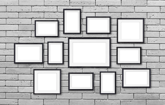 Photo frames mockup, twelve set collection on bricks wall, 3D illustration	