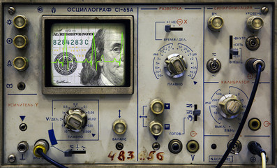 Dollar banknote on the screen of an old oscilloscope
