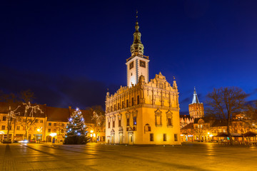 Fototapeta na wymiar Old town square with historical town hall in Chelmno at night, Poland