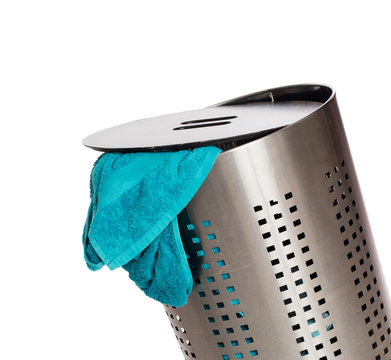Dirty laundry in a metal basket