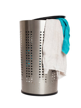Dirty laundry in a metal basket
