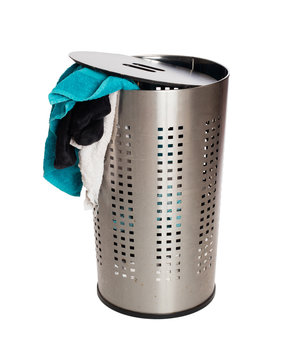 Dirty laundry in a metal basket