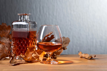 Brandy and dried up oak leaves .