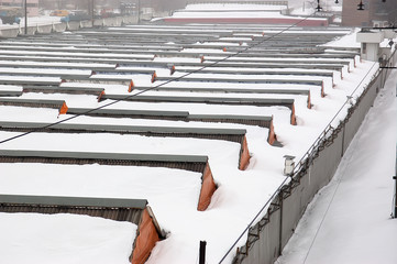 Heavy snowfall covering the whole warehouses