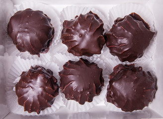 Homemade marshmallowsin the glaze chocolate . zephyr. Handmade sweets.