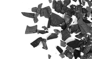 Pile charcoal isolated on white background, xylanthrax, wood coal, top view