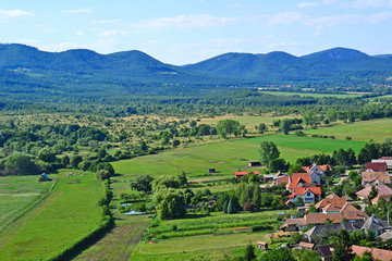 Naklejka premium View of a Hungarian village and mountains