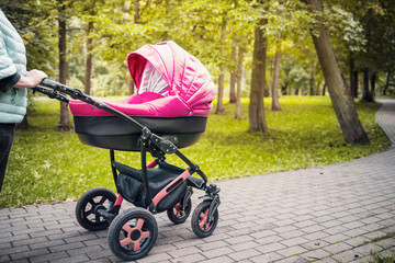 A stroller strolls in the park 