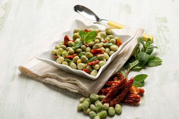 broad beans salad with dried tomatoes and mint