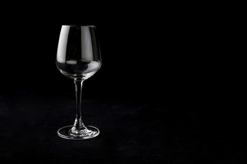 Wine glass on the black background