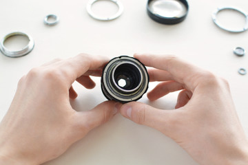 Repair manual camera lens.