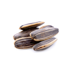 sunflower seeds pile against isolated on white background