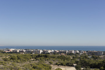 Fototapeta na wymiar Skyline of the town of La Marina in the municipality of Elche, province of Alicante