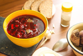 Red borscht or beetroot soup with sour cream