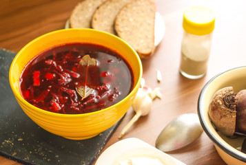 Red borscht or beetroot soup with sour cream