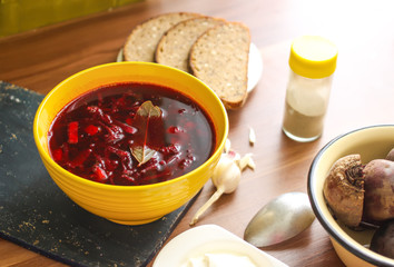 Red borscht or beetroot soup with sour cream