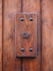 Fototapeta premium Wooden door, detail. Door lock.
