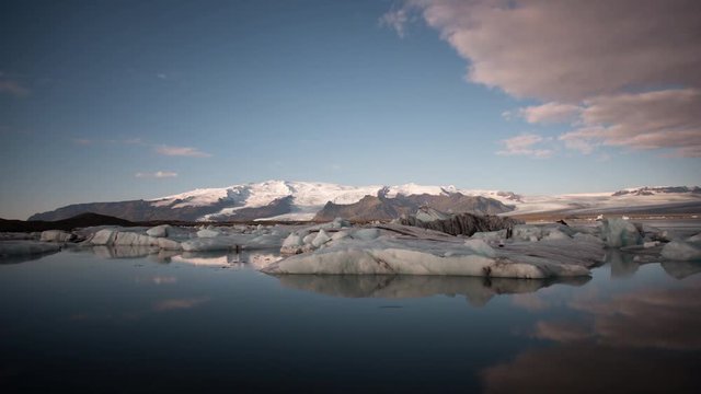 ICELAND &ndash;  2016 : Timelapse of Glacier Lagoon / J&ouml;kulsarl&oacute;n at sunrise with icebergs and clouds in view