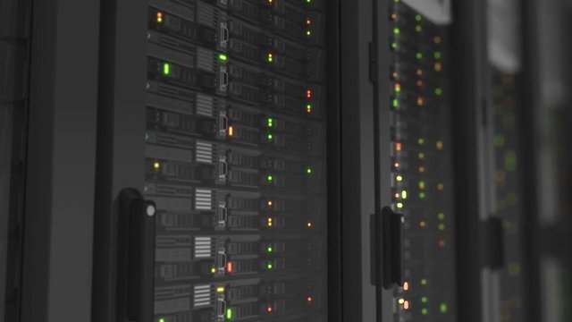 Flashing Lights on Working Servers Close-up in Modern Data Center. Cloud Computing Data Storage. Heavy 3d Rendering. Looped 3d animation. 4k Ultra HD 3840x2160.
