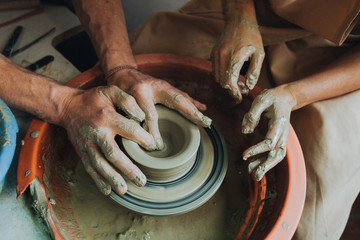 Potter teaches how make clay pot
