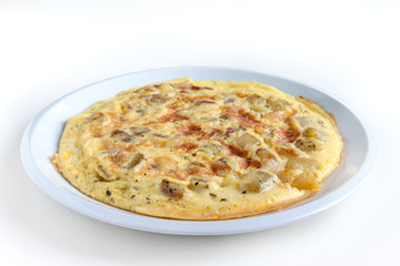italian frittata on white background, typical dish with eggs, potatoes and bacon
