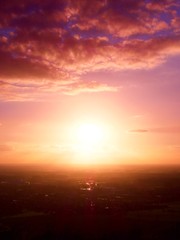Warm colors of sunset air over town in countryside