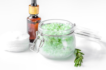 organic cosmetics with extracts of herbs rosemary on white backg