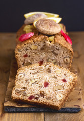 Homemade Tasty Fruit Cake Cake with Dried Fruit and Nuts Wooden Background Vertical Toned