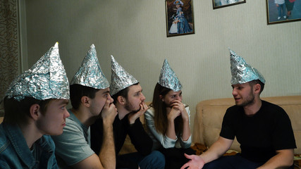 Friends are afraid for their thoughts and put foil on your head to protect your mind from...