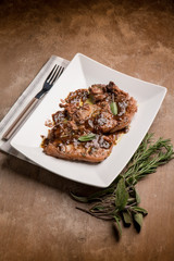 steak cooked on red wine and mixed herbs