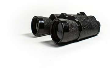 black binoculars on a white background