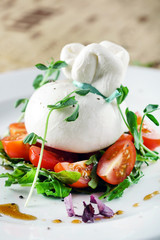 burrata, fresh italian cheese made from mozzarella and cream