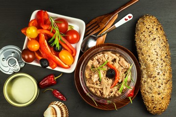 Pieces of tuna with vegetables. Preserved crushed tuna. Vegetables and fish. Healthy food for...