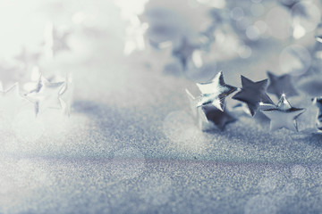 Silver Christmas composition with tiny stars sparkling