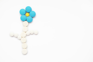 flower made from multicolor tablets, safe treatment concept