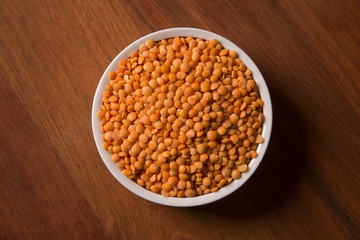lentils on wood background
